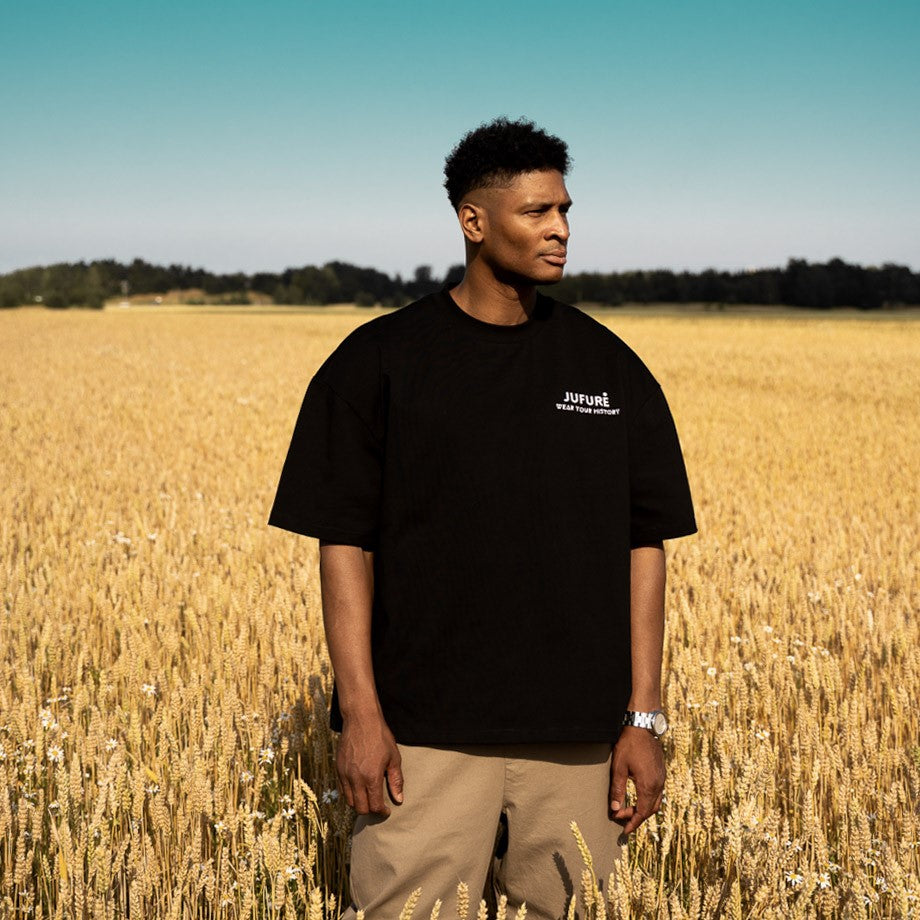 Black Membership Tee — Strength (Heart Logo)